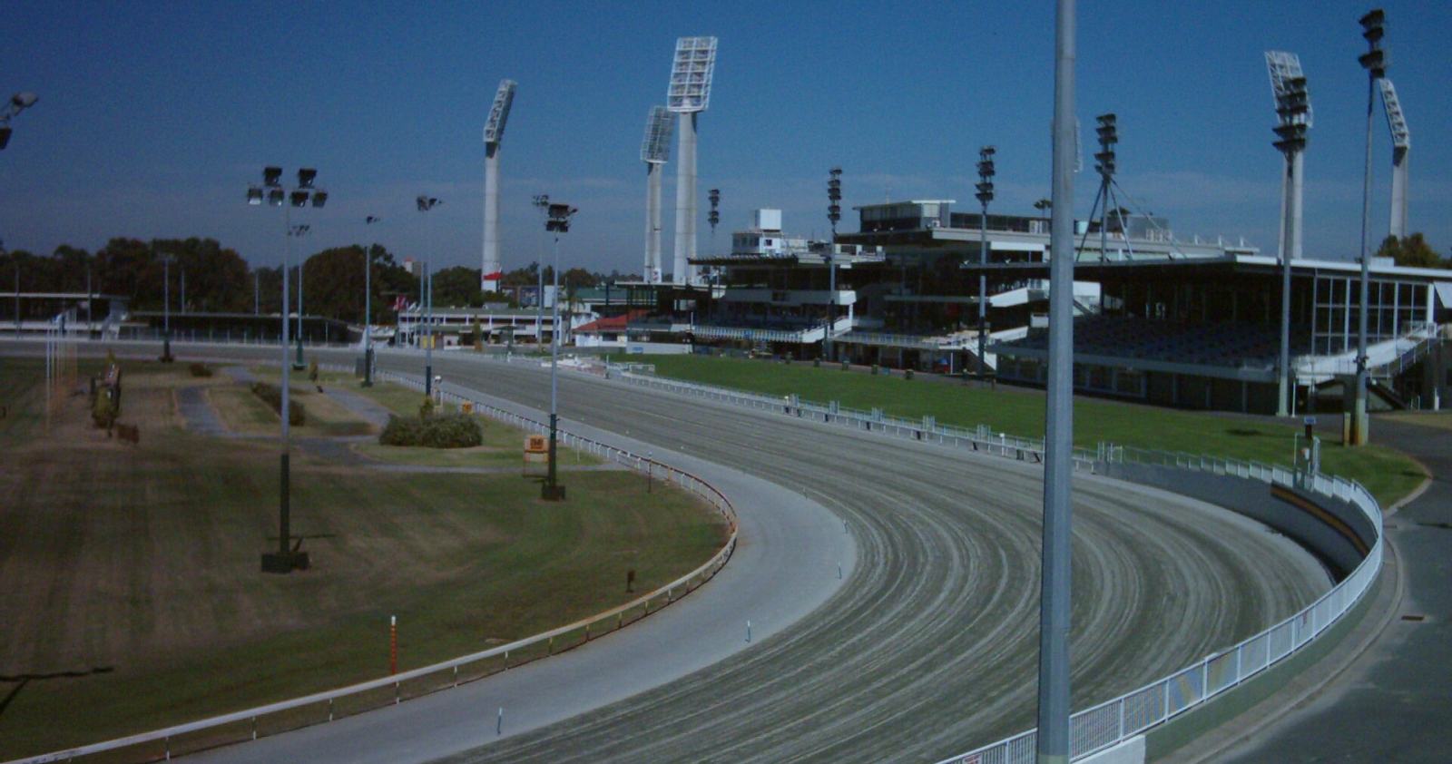 The floodlit track and grandstand at Gloucester Park, the harness racing venue in Perth